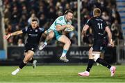 21 March 2025; Sean O'Brien of Munster in action against Kyle Rowe of Glasgow Warriors during the United Rugby Championship match between Glasgow Warriors and Munster at Scotstoun Stadium in Glasgow, Scotland. Photo by Ewan Bootman/Sportsfile