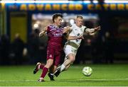 21 March 2025; Cian Bargary of Cobh Ramblers in action against Aaron Connolly of Athlone Town during the SSE Airtricity Men's First Division match between Cobh Ramblers and Athlone Town at St Colman's Park in Cobh, Cork. Photo by Michael P Ryan/Sportsfile
