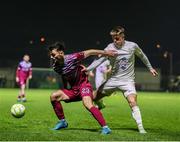 21 March 2025; Shane Griffin of Cobh Ramblers in action against Dylan Hand of Athlone Town during the SSE Airtricity Men's First Division match between Cobh Ramblers and Athlone Town at St Colman's Park in Cobh, Cork. Photo by Michael P Ryan/Sportsfile