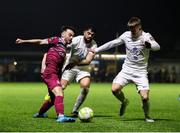 21 March 2025; Shane Griffin of Cobh Ramblers in action against Athlone Town players Declan McDaid, left, and Kyle O'Connor during the SSE Airtricity Men's First Division match between Cobh Ramblers and Athlone Town at St Colman's Park in Cobh, Cork. Photo by Michael P Ryan/Sportsfile