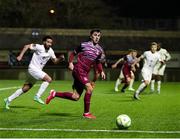 21 March 2025; Barry Coffey of Cobh Ramblers in action against Bastien Hery of Athlone Town during the SSE Airtricity Men's First Division match between Cobh Ramblers and Athlone Town at St Colman's Park in Cobh, Cork. Photo by Michael P Ryan/Sportsfile