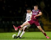 21 March 2025; Kailin Barlow of Athlone Town in action against  Niall O'Keeffe of Cobh Ramblers during the SSE Airtricity Men's First Division match between Cobh Ramblers and Athlone Town at St Colman's Park in Cobh, Cork. Photo by Michael P Ryan/Sportsfile