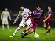 21 March 2025; Dale Holland of Cobh Ramblers in action against Declan McDaid of Athlone Town during the SSE Airtricity Men's First Division match between Cobh Ramblers and Athlone Town at St Colman's Park in Cobh, Cork. Photo by Michael P Ryan/Sportsfile