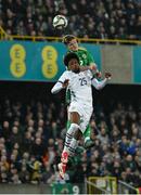 21 March 2025; Terry Devlin of Northern Ireland in action against Alvyn Sanches of Switzerland during the international friendly match between Northern Ireland and Switzerland at the National Football Stadium at Windsor Park in Belfast. Photo by Ben McShane/Sportsfile