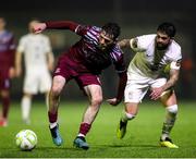 21 March 2025; Dale Holland of Cobh Ramblers in action against Declan McDaid of Athlone Town during the SSE Airtricity Men's First Division match between Cobh Ramblers and Athlone Town at St Colman's Park in Cobh, Cork. Photo by Michael P Ryan/Sportsfile