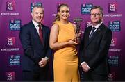 21 March 2025; Sarsfields camogie player Maria Cooney is presented her 2024 Camogie Team of the Year award by Uachtarán an Cumann Camógaíochta, Brian Molloy, right, and Chief Marketing Officer of AIB, Mark Doyle during the AIB Club Player Awards at Croke Park in Dublin. The AIB Club Player Awards celebrated the best players from club Football, Hurling, Camogie, and LGFA in a single ceremony for the first time, recognising their outstanding achievements on the field throughout the season. Photo by Seb Daly/Sportsfile