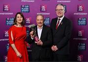 21 March 2025; Liam Kearney, father of Sarsfields hurler Daniel Kearney receives with his sons 2024/25 Hurling Team of the Year award from Uachtarán Cumann Lúthchleas Gael, Jarlath Burns and Chief Customer Officer of AIB, Orlaith Ryan during the AIB Club Player Awards at Croke Park in Dublin. The AIB Club Player Awards celebrated the best players from club Football, Hurling, Camogie, and LGFA in a single ceremony for the first time, recognising their outstanding achievements on the field throughout the season. Photo by Sam Barnes/Sportsfile