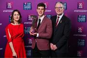 21 March 2025; Slaughtneil hurler Shane McGuigan is presented with his 2024/25 Hurling Team of the Year award by Uachtarán Cumann Lúthchleas Gael, Jarlath Burns and Chief Customer Officer of AIB, Orlaith Ryan during the AIB Club Player Awards at Croke Park in Dublin. The AIB Club Player Awards celebrated the best players from club Football, Hurling, Camogie, and LGFA in a single ceremony for the first time, recognising their outstanding achievements on the field throughout the season. Photo by Sam Barnes/Sportsfile