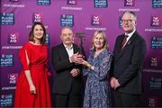 21 March 2025; Liam and Marion Kearney, parents of Sarsfields hurler Daniel Kearney, are  presented their sons 2024/25 Hurling Team of the Year award by Uachtarán Cumann Lúthchleas Gael, Jarlath Burns and Chief Customer Officer of AIB, Orlaith Ryan during the AIB Club Player Awards at Croke Park in Dublin. The AIB Club Player Awards celebrated the best players from club Football, Hurling, Camogie, and LGFA in a single ceremony for the first time, recognising their outstanding achievements on the field throughout the season. Photo by Sam Barnes/Sportsfile
