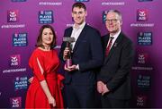 21 March 2025; Cuala footballer Peadar Ó Cofaigh Byrne is presented with his 2024/25 Football Team of the Year award by Uachtarán Cumann Lúthchleas Gael, Jarlath Burns and Chief Customer Officer of AIB, Orlaith Ryan, during the AIB Club Player Awards at Croke Park in Dublin. The AIB Club Player Awards celebrated the best players from club Football, Hurling, Camogie, and LGFA in a single ceremony for the first time, recognising their outstanding achievements on the field throughout the season. Photo by Sam Barnes/Sportsfile