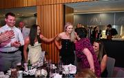 21 March 2025; 2024 AIB Ladies Gaelic Football Club Championship Player of the Year, Louise Ward of Kilkerrin-Clonberne, centre, is congratulated by friends and family as she makes her way to the stage to collect her award during the AIB Club Player Awards at Croke Park in Dublin. The AIB Club Player Awards celebrated the best players from club Football, Hurling, Camogie, and LGFA in a single ceremony for the first time, recognising their outstanding achievements on the field throughout the season. Photo by Sam Barnes/Sportsfile