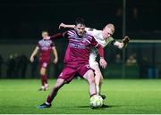 21 March 2025; Dale Holland of Cobh Ramblers in action against Aaron Connolly of Athlone Town during the SSE Airtricity Men's First Division match between Cobh Ramblers and Athlone Town at St Colman's Park in Cobh, Cork. Photo by Michael P Ryan/Sportsfile