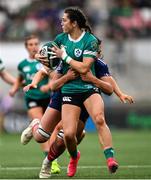 22 March 2025; Amee-Leigh Costigan of Ireland is tackled by Teani Feleu of France during the Women's Six Nations Rugby Championship match between Ireland and France at Kingspan Stadium in Belfast. Photo by Ramsey Cardy/Sportsfile