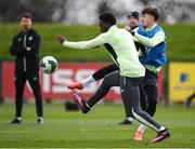 22 March 2025; James Abankwah is tackled by Rocco Vata, right, during a Republic of Ireland training session at the FAI National Training Centre in Abbotstown, Dublin. Photo by Stephen McCarthy/Sportsfile
