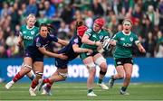 22 March 2025; Aoife Wafer of Ireland is tackled by Charlotte Escudero of France during the Women's Six Nations Rugby Championship match between Ireland and France at Kingspan Stadium in Belfast. Photo by Ramsey Cardy/Sportsfile