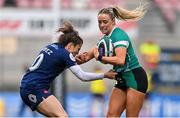22 March 2025; Stacey Flood of Ireland is tackled by Carla Arbez of France during the Women's Six Nations Rugby Championship match between Ireland and France at Kingspan Stadium in Belfast. Photo by Ramsey Cardy/Sportsfile