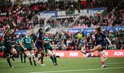 22 March 2025; Carla Arbez of France kicks under pressure from Erin King of Ireland during the Women's Six Nations Rugby Championship match between Ireland and France at Kingspan Stadium in Belfast. Photo by Ramsey Cardy/Sportsfile