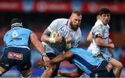 22 March 2025; RG Snyman of Leinster is tackled by Marcell Coetzee, left, and Alulutho Tshakweni of Vodacom Bulls during the United Rugby Championship match between Vodacom Bulls and Leinster at Loftus Versfeld Stadium in Pretoria, South Africa. Photo by Shaun Roy/Sportsfile