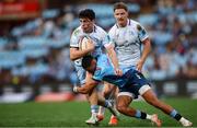 22 March 2025; Jimmy O'Brien of Leinster is tackled by Keagan Johannes of Vodacom Bulls during the United Rugby Championship match between Vodacom Bulls and Leinster at Loftus Versfeld Stadium in Pretoria, South Africa. Photo by Shaun Roy/Sportsfile