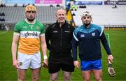 22 March 2025; Referee Johnny Murphy with Offaly captain Ciaran Burke and Waterford captain Dessie Hutchinson before the Allianz Hurling League Division 1B match between Waterford and Offaly at Walsh Park in Waterford. Photo by Seb Daly/Sportsfile