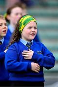 22 March 2025; Emma O'Sullivan, a student from Kilmurry National School in Cordal, Kerry, performs Amhrán na bhFiann by sign language with her class and teacher, Kerry footballer Eilís Lynch, not pictured, before the Lidl Ladies National Football League Division 1 Round 6 match between Kerry and Meath at Austin Stack Park in Tralee, Kerry. Photo by Brendan Moran/Sportsfile