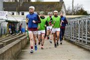 22 March 2025; Eamon Cunneen of Westmeath and his team-mates on the way out to the warm-up before the Allianz Hurling League Division 1B match between Carlow and Westmeath at Netwatch Cullen Park in Carlow. Photo by Matt Browne/Sportsfile