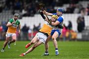 22 March 2025; Dan Bourke of Offaly in action against Kieran Bennett of Waterford during the Allianz Hurling League Division 1B match between Waterford and Offaly at Walsh Park in Waterford. Photo by Seb Daly/Sportsfile
