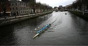 22 March 2025; UCD Boat Club, Bow Eoin McGrath, David Ross-Chu, Andrew O’Leary, Ciaran Conway, Paul Flood, Ross Mason, Daire Lynch, Stroke Dach Murray and Cox Rhian Nelson contest the Gannon Cup lead Dublin University Boat Club as they pass the FourCourts during the 75th annual Colours Boat Race between UCD and Trinity College on the River Liffey in Dublin. Photo by Ray McManus/Sportsfile
