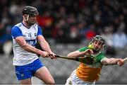 22 March 2025; Patrick Curran of Waterford in action against Jason Sampson of Offaly during the Allianz Hurling League Division 1B match between Waterford and Offaly at Walsh Park in Waterford. Photo by Seb Daly/Sportsfile