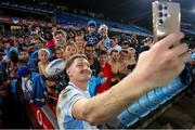 22 March 2025; Jordie Barrett of Leinster takes a selfie with supporters after the United Rugby Championship match between Vodacom Bulls and Leinster at Loftus Versfeld Stadium in Pretoria, South Africa. Photo by Shaun Roy/Sportsfile