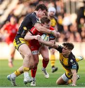 22 March 2025; Jack Murphy of Ulster is tackled by Joe Westwood and Huw Anderson of Dragons during the United Rugby Championship match between Dragons and Ulster at Rodney Parade in Newport, Wales. Photo by Chris Fairweather/Sportsfile