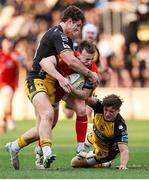 22 March 2025; Jack Murphy of Ulster is tackled by Joe Westwood and Huw Anderson of Dragons during the United Rugby Championship match between Dragons and Ulster at Rodney Parade in Newport, Wales. Photo by Chris Fairweather/Sportsfile