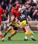 22 March 2025; Jacob Stockdale of Ulster is tackled by Will Reed of Dragons during the United Rugby Championship match between Dragons and Ulster at Rodney Parade in Newport, Wales. Photo by Chris Fairweather/Sportsfile