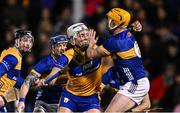 22 March 2025; Jack Kirwan of Clare is tackled by Ronan Maher of Tipperary during the Allianz Hurling League Division 1A match between Tipperary and Clare at FBD Semple Stadium in Thurles, Tipperary. Photo by Ben McShane/Sportsfile