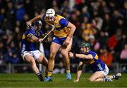 22 March 2025; Jack Kirwan of Clare is tackled by Willie Connors, left, and Robert Doyle of Tipperary during the Allianz Hurling League Division 1A match between Tipperary and Clare at FBD Semple Stadium in Thurles, Tipperary. Photo by Ben McShane/Sportsfile