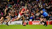 22 March 2025; Darragh Fitzgibbon of Cork handpasses the sliotar as referee Chris Mooney ducks out of the way during the Allianz Hurling League Division 1A match between Cork and Galway at SuperValu Páirc Uí Chaoimh in Cork. Photo by Piaras Ó Mídheach/Sportsfile