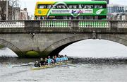22 March 2025; The UCD Senior Men's team, Bow, Eoin McGrath, David Ross-Chu, Andrew O’Leary, Ciaran Conway, Paul Flood, Ross Mason, Daire Lynch, Stroke Dach Murray and Cox Rhian Nelson make their way to the starting line before the 75th annual Colours Boat Race between UCD and Trinity College on the River Liffey in Dublin. Photo by Shauna Clinton/Sportsfile