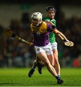 22 March 2025; Jack Redmond of Wexford is tackled by Darragh O'Donovan of Limerick during the Allianz Hurling League Division 1A match between Limerick and Wexford at TUS Gaelic Grounds in Limerick. Photo by Tom Beary/Sportsfile