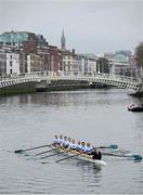 22 March 2025; The UCD Novice Women's team, from front to back, Carrie Savage, Kate Ormsby, Isabella Devitt, Aoife Rendu, Martina D’Amico, Kate O’Doherty, Evie Jennings, Leonore Church and Jessica Chamberlain make their way to the starting line before the 75th annual Colours Boat Race between UCD and Trinity College on the River Liffey in Dublin. Photo by Shauna Clinton/Sportsfile