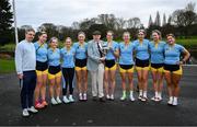 22 March 2025; The UCD Senior Women's with founder of UCD Women's rowing team Jaye Renehan, centre, with the Corcoran Cup Trophy after the 75th annual Colours Boat Race between UCD and Trinity College on the River Liffey in Dublin.  Photo by Shauna Clinton/Sportsfile