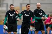 22 March 2025; Ireland head coach Scott Bemand, centre, with athletic performance coach Ed Slattery, left, and defence coach Hugh Hogan before the Women's Six Nations Rugby Championship match between Ireland and France at Kingspan Stadium in Belfast. Photo by Ramsey Cardy/Sportsfile