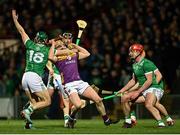 22 March 2025; Simon Donohoe of Wexford is fouled by Sean Finn of Limerick during the Allianz Hurling League Division 1A match between Limerick and Wexford at TUS Gaelic Grounds in Limerick. Photo by Tom Beary/Sportsfile