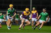 22 March 2025;Damien Reck of Wexford in action against Tom Morrisey of Limerick during the Allianz Hurling League Division 1A match between Limerick and Wexford at TUS Gaelic Grounds in Limerick. Photo by John Sheridan/Sportsfile