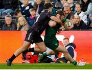 22 March 2025; Hugh Gavin of Connacht is tackled by Evardi Boshoff of Ospreys during the United Rugby Championship match between Ospreys and Connacht at Swansea.com Stadium in Swansea, Wales. Photo by Geraint Nicholas/Sportsfile