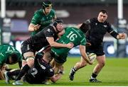 22 March 2025; Dylan Tierney-Martin of Connacht is tackled by Adam Beard of Ospreys during the United Rugby Championship match between Ospreys and Connacht at Swansea.com Stadium in Swansea, Wales. Photo by Geraint Nicholas/Sportsfile