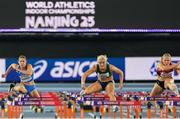 23 March 2025; Sarah Lavin of Ireland, centre, competes in the women's 60m hurdles heats during day three of the World Indoor Athletics Championships at Nanjing's Cube Gymnasium at the Nanjing Youth Olympic Sports Park in Nanjing, China. Photo by Sportsfile