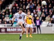 23 March 2025; Niall Kelly of Kildare kicks a point during the Allianz Football League Division 3 match between Kildare and Antrim at Cedral St. Conleth's Park in Newbridge, Kildare. Photo by Thomas Flinkow/Sportsfile