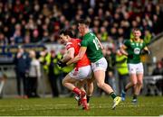 23 March 2025; Andy McDonnell of Louth in action against Conor Duke of Meath during the Allianz Football League Division 2 match between Louth and Meath at Grattan Park in Inniskeen, Monaghan. Photo by Daire Brennan/Sportsfile