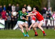 23 March 2025; Jordan Morris of Meath in action against Andy McDonnell of Louth during the Allianz Football League Division 2 match between Louth and Meath at Grattan Park in Inniskeen, Monaghan. Photo by Daire Brennan/Sportsfile