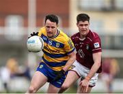 23 March 2025; Ciaráin Murtagh of Roscommon in action against Fionn O'Hara of Westmeath during the Allianz Football League Division 2 match between Westmeath and Roscommon at TEG Cusack Park in Mullingar, Westmeath. Photo by Michael P Ryan/Sportsfile